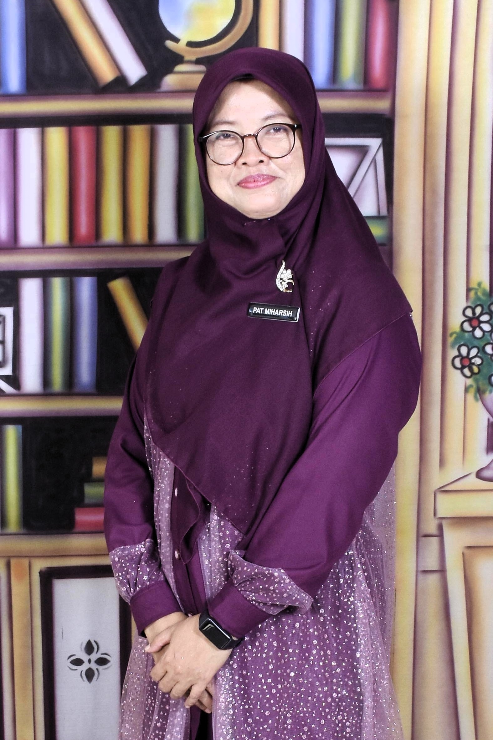 Pat Miharsih, S. T.